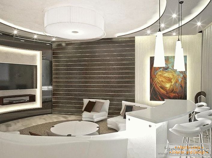 Dizajner je uspešno izabrao rasvjetu za dnevnu sobu u stilu visokotehnoloških. Višeslojni spušteni plafoni povoljno gledaju sa spot osvetljenjem.