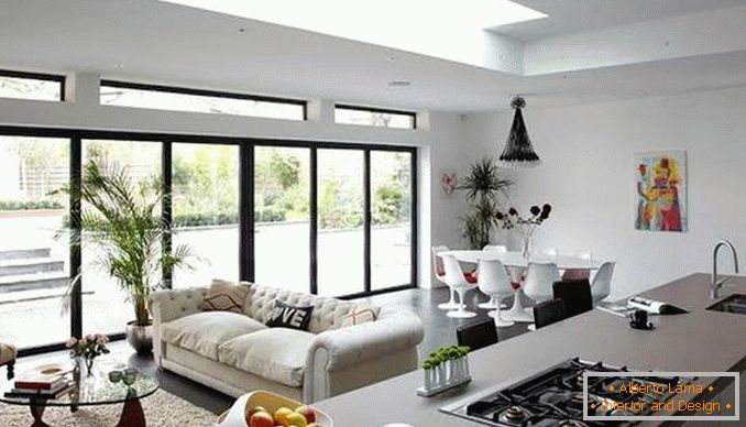 Dizajn studio apartmani s panoramskim prozorima - fotografija kuhinje dnevne sobe