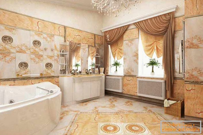 Boja slonovače harmonično kombinuje sa nijansama svetlo narandžaste u kupatilu, ukrašene u Empire stilu.