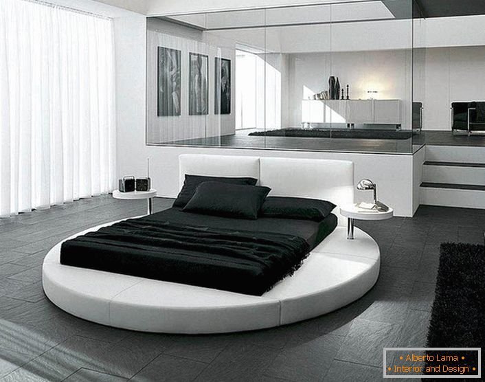 Dizajn spavaće sobe u stilu minimalizma naglašava se pravilno odabranim namještajem. Interesantan detalj enterijera je okrugli krevet.