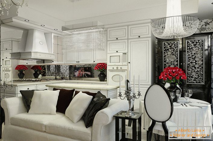 Kuhinja-dnevni boravak u stilu art deco sa belim apartmanom i ugrađenim aparatima.